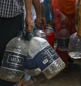 People stock up on water in Dhaka, Bangladesh, because of drought (Kazi Salahuddin Razu/NurPhoto via Getty Images)