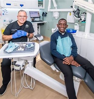 Dr. Robert Aslan with his “patient” Fr Richard Ddumba, who celebrated the first anniversary Mass for the surgery on 13 June. Photo: Giovanni Portelli